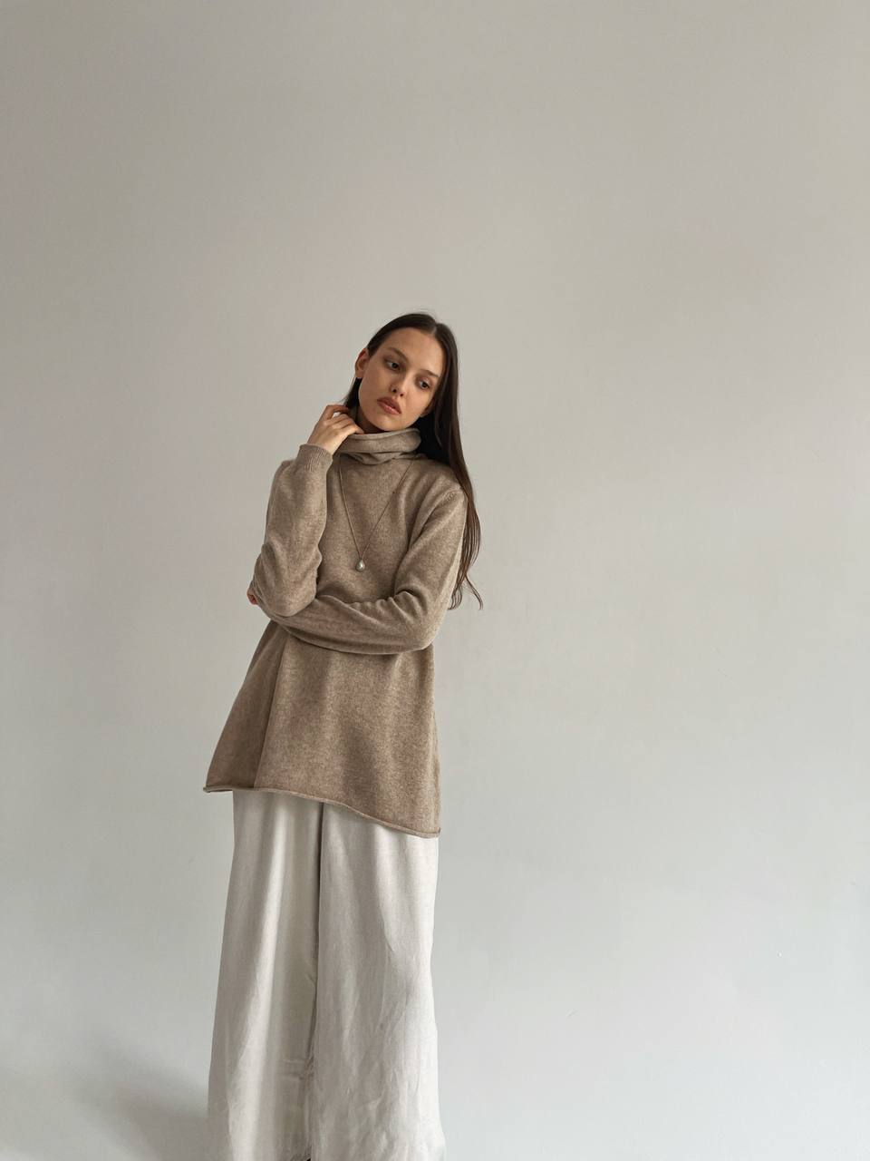 Beige 100% wool oversized turtleneck sweater