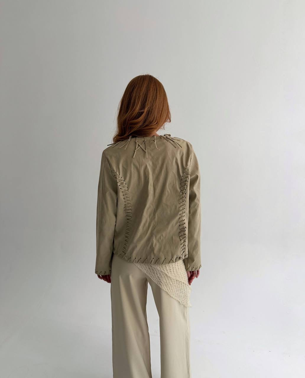 Vintage beige faux leather jacket with fringe detailing