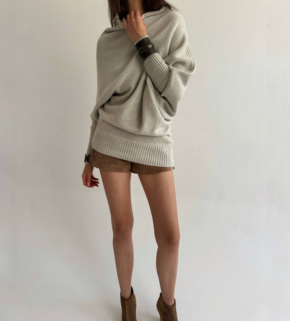 Asymmetrical beige sweater