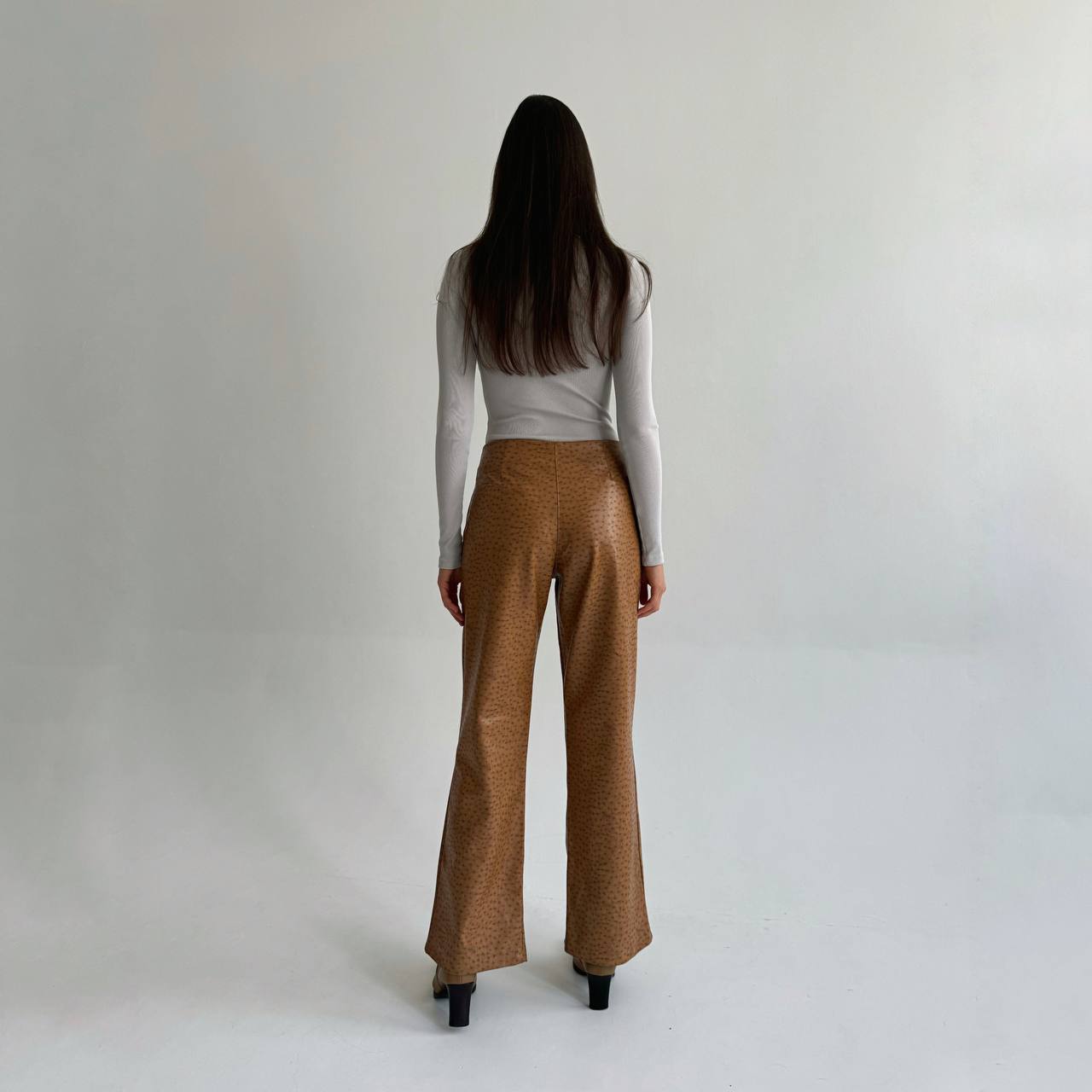 Vintage pleated flared pants with a cow print