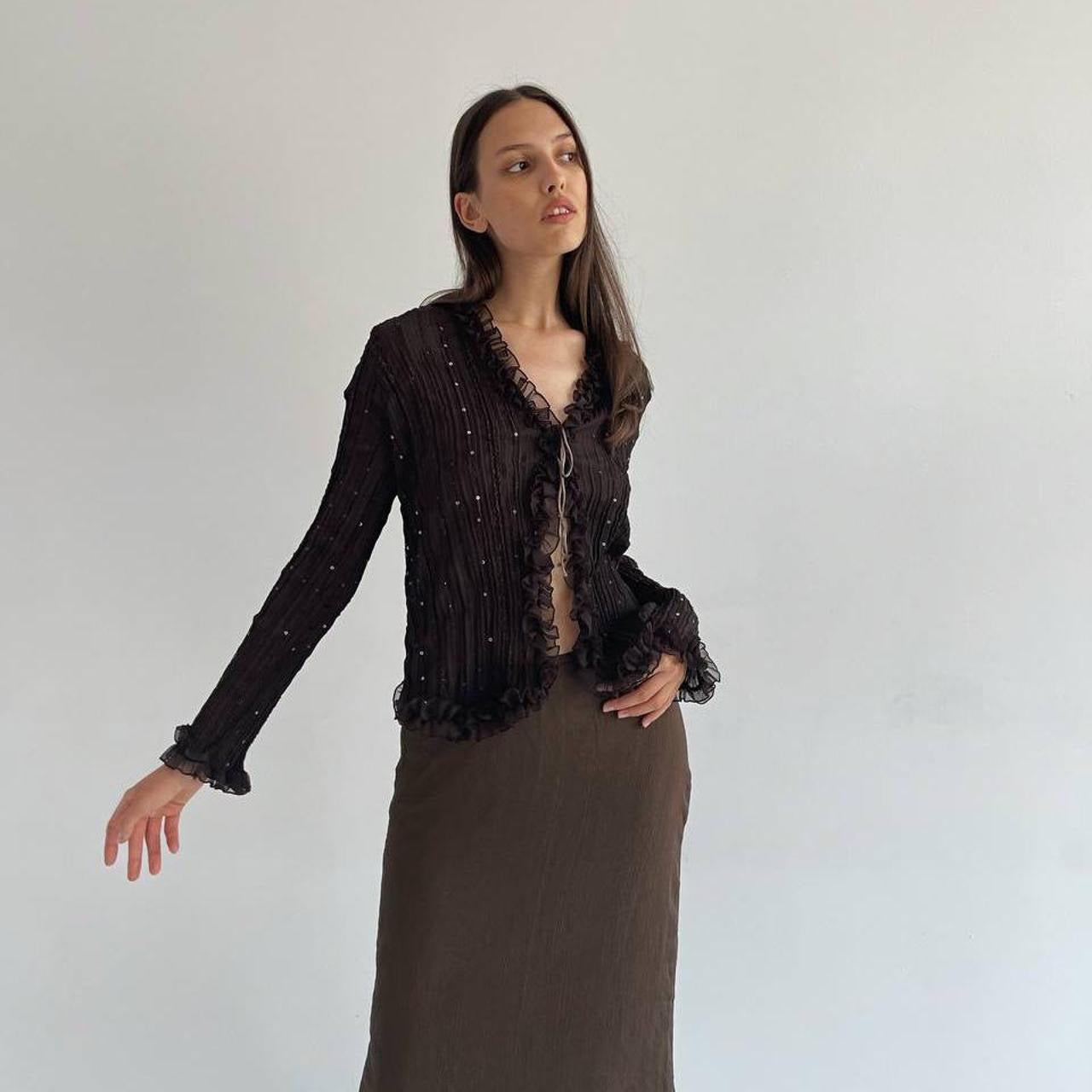 Vintage pleated blouse with sequins and ruffles