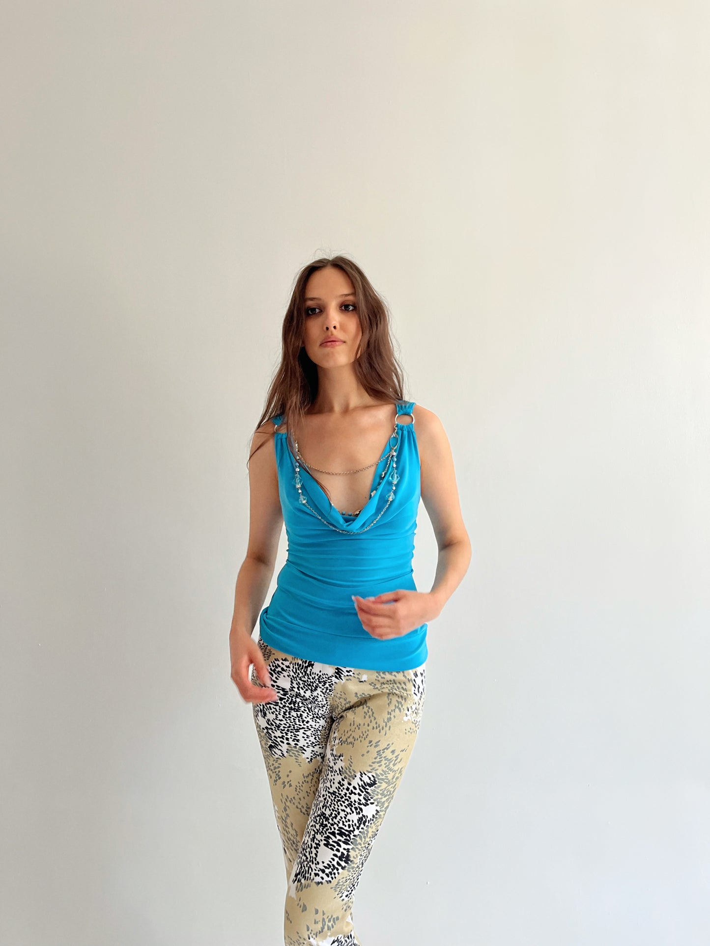 Vintage turquoise top with a necklace