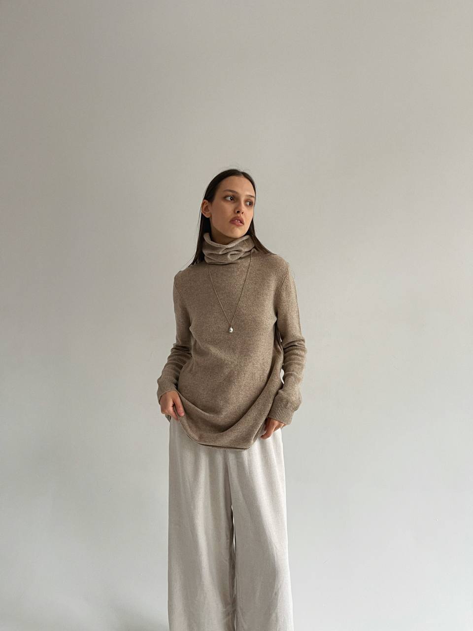 Beige 100% wool oversized turtleneck sweater
