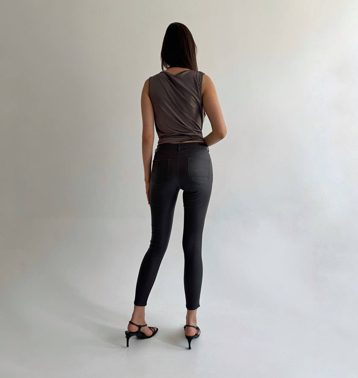 Black wax skinny jeans