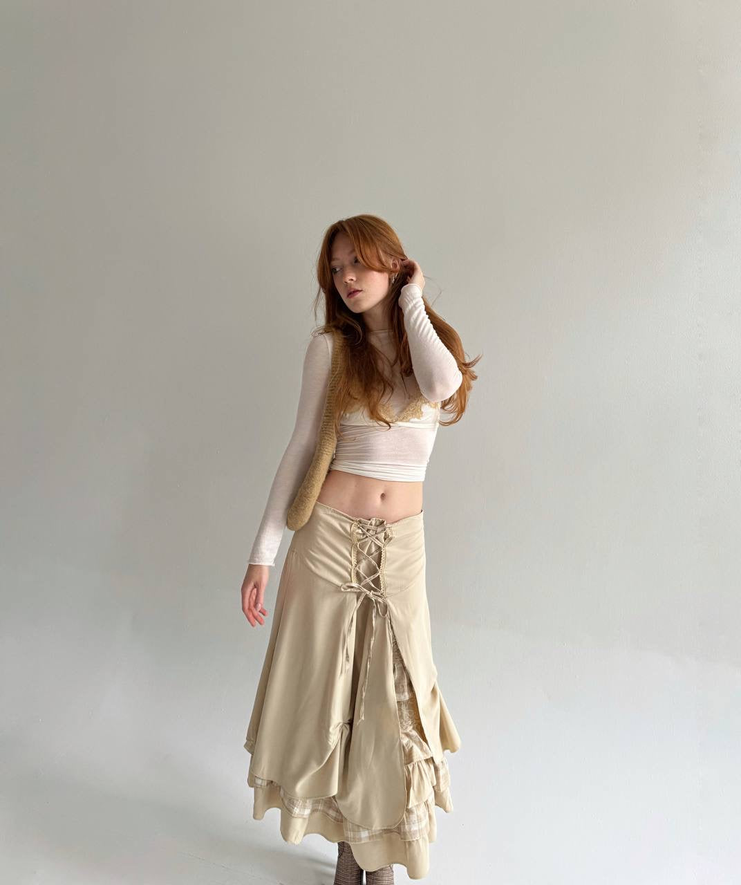 Vintage beige draped skirt with lace and checker pattern details