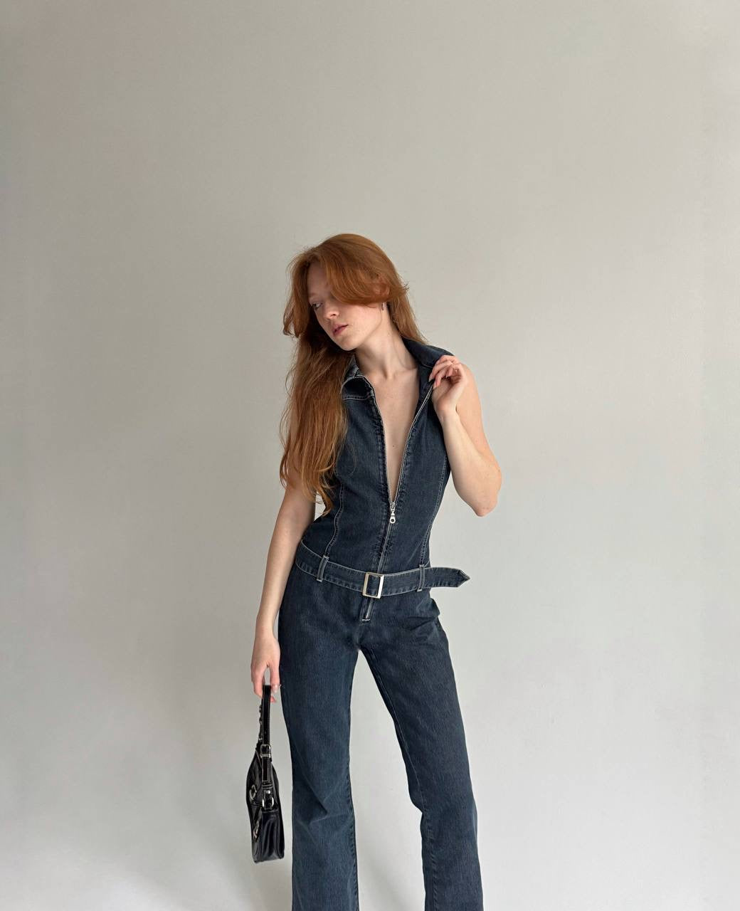 Vintage denim jumpsuit with a belt and front zip