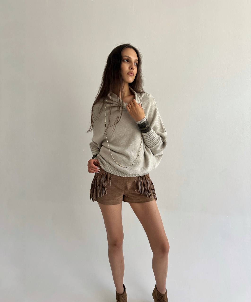 Asymmetrical beige sweater