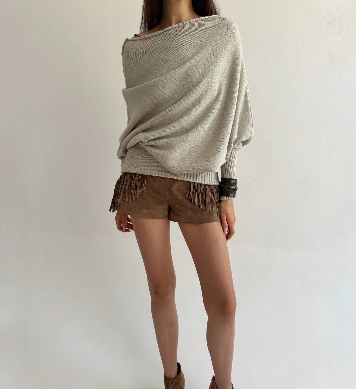 Asymmetrical beige sweater