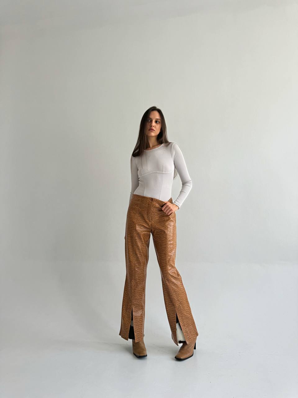 Vintage pleated flared pants with a cow print