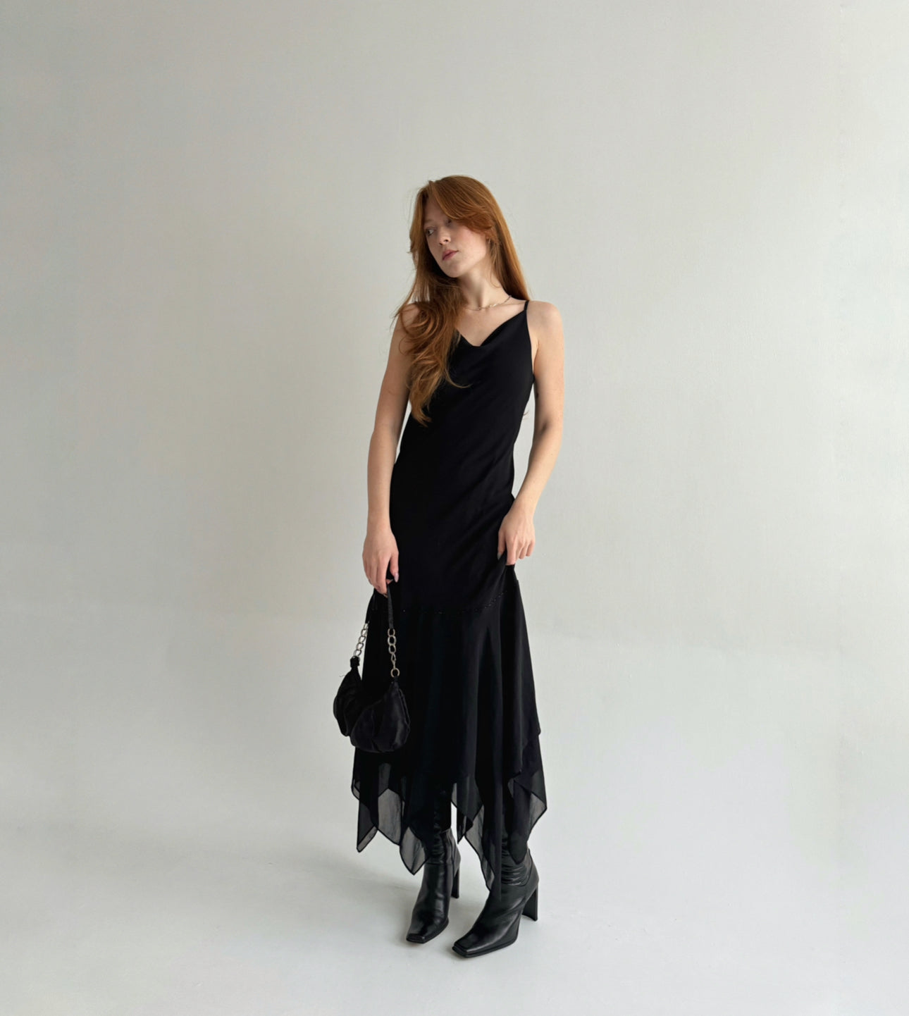 Vintage black maxi dress with asymmetrical bottom
