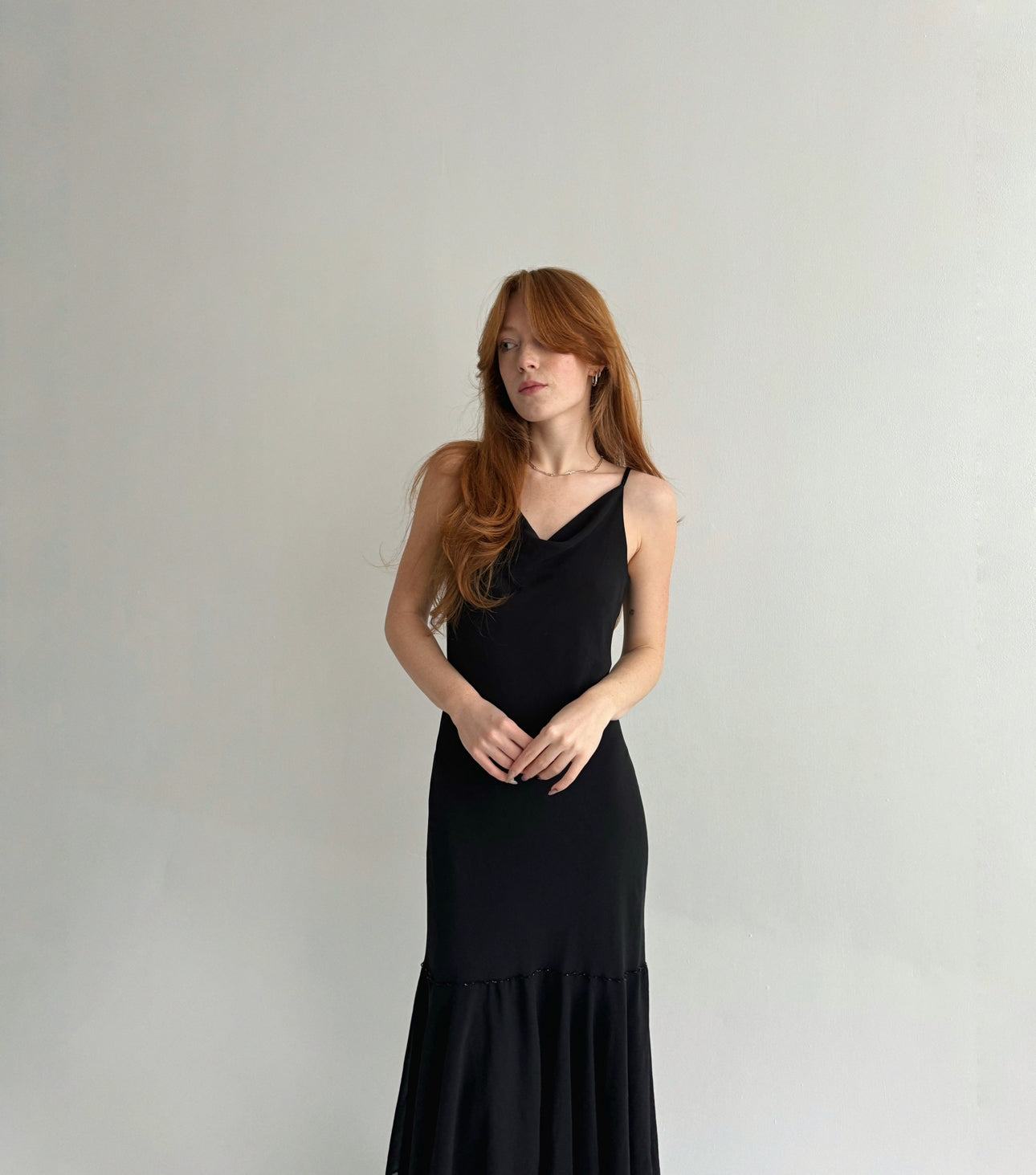 Vintage black maxi dress with asymmetrical bottom
