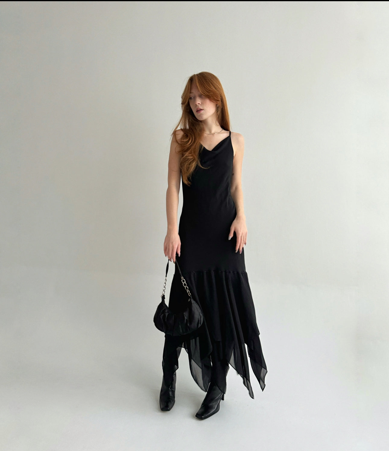 Vintage black maxi dress with asymmetrical bottom