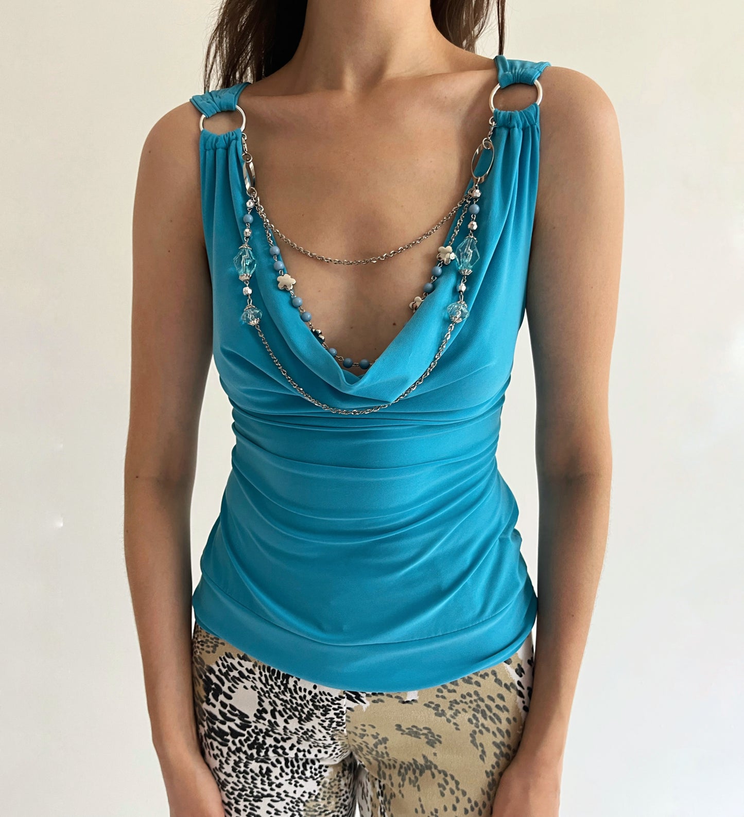 Vintage turquoise top with a necklace