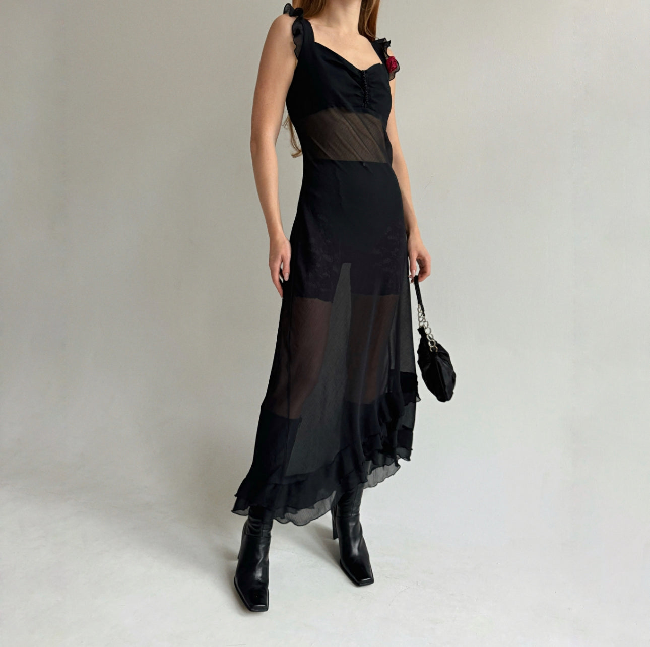 Vintage black maxi dress with asymmetrical ruffled bottom trim