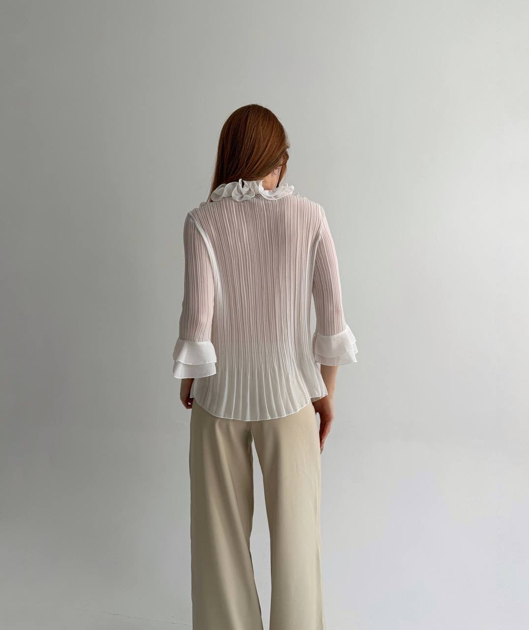 Vintage white pleated blouse with ruffles