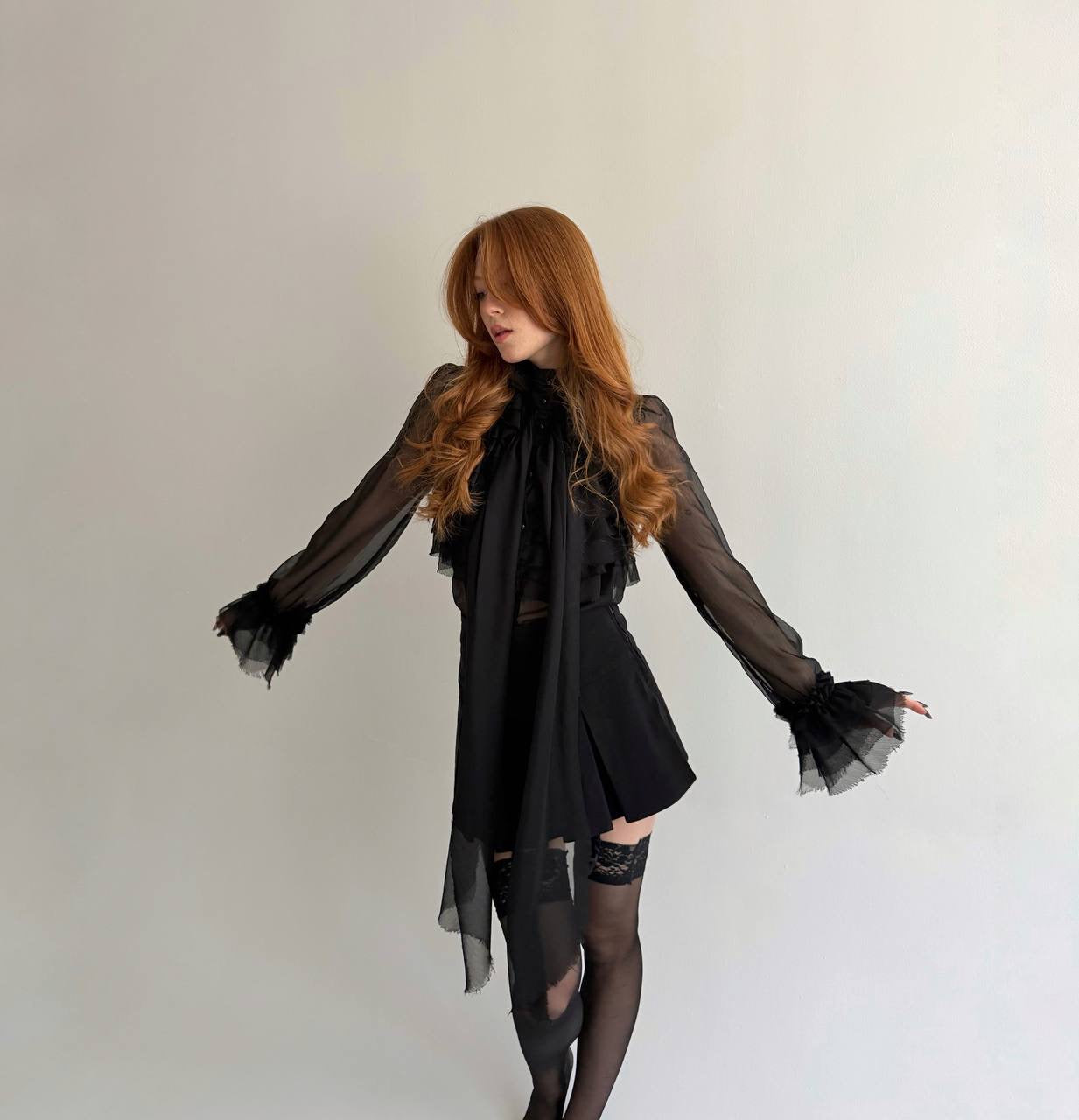 Y2K sheer black blouse with raw trim