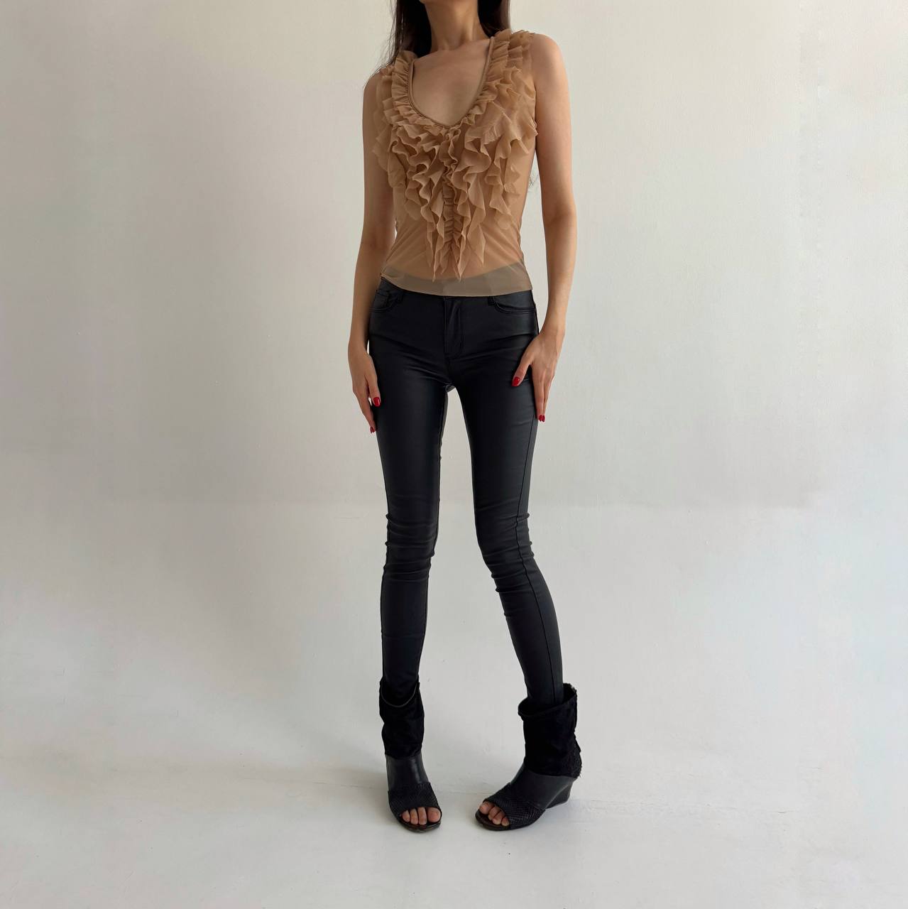 Black wax skinny jeans