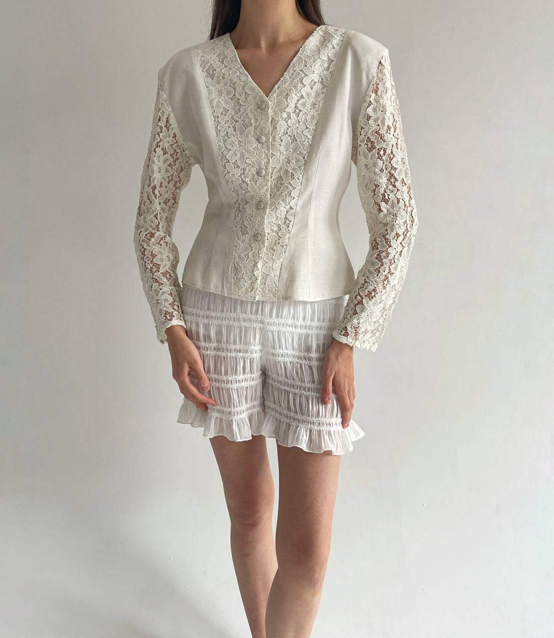 Vintage cotton blouse with lace detailing and shoulder pads