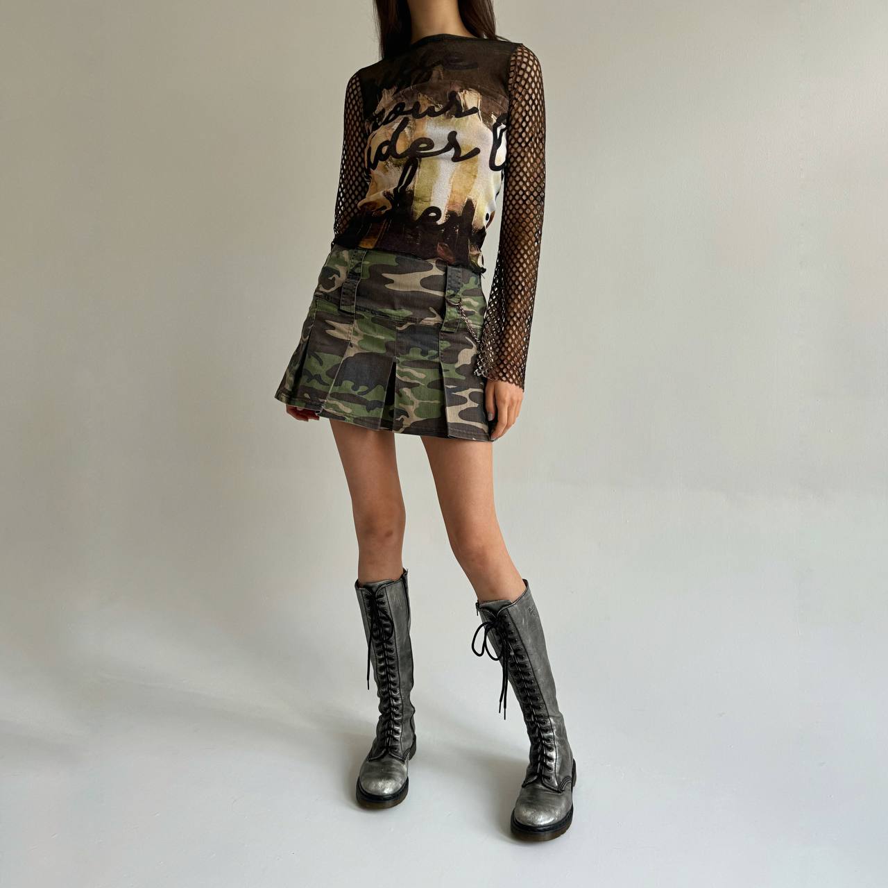 Vintage camouflage mini pleated skirt with a chain