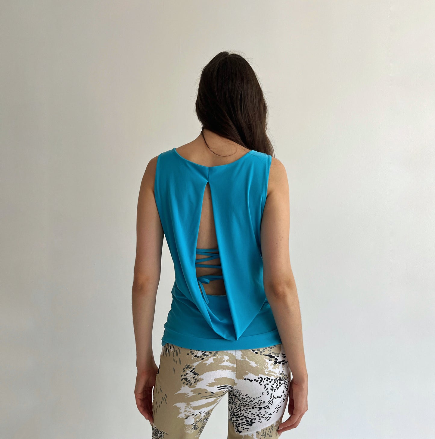 Vintage turquoise top with a necklace