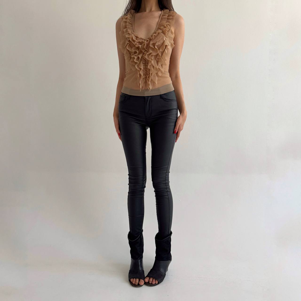 Black wax skinny jeans