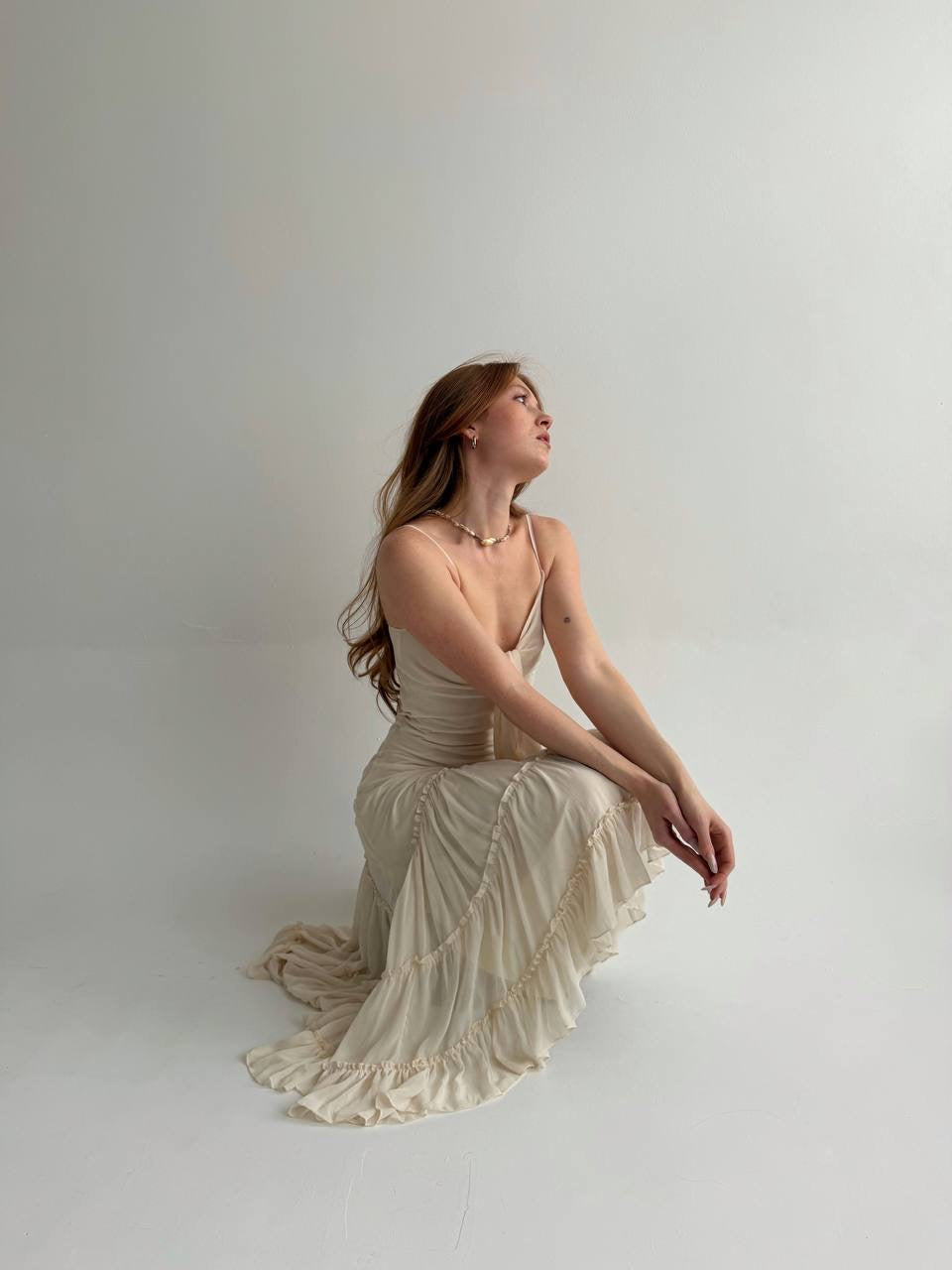 Vintage asymmetrical dress with pleated ruched bottom