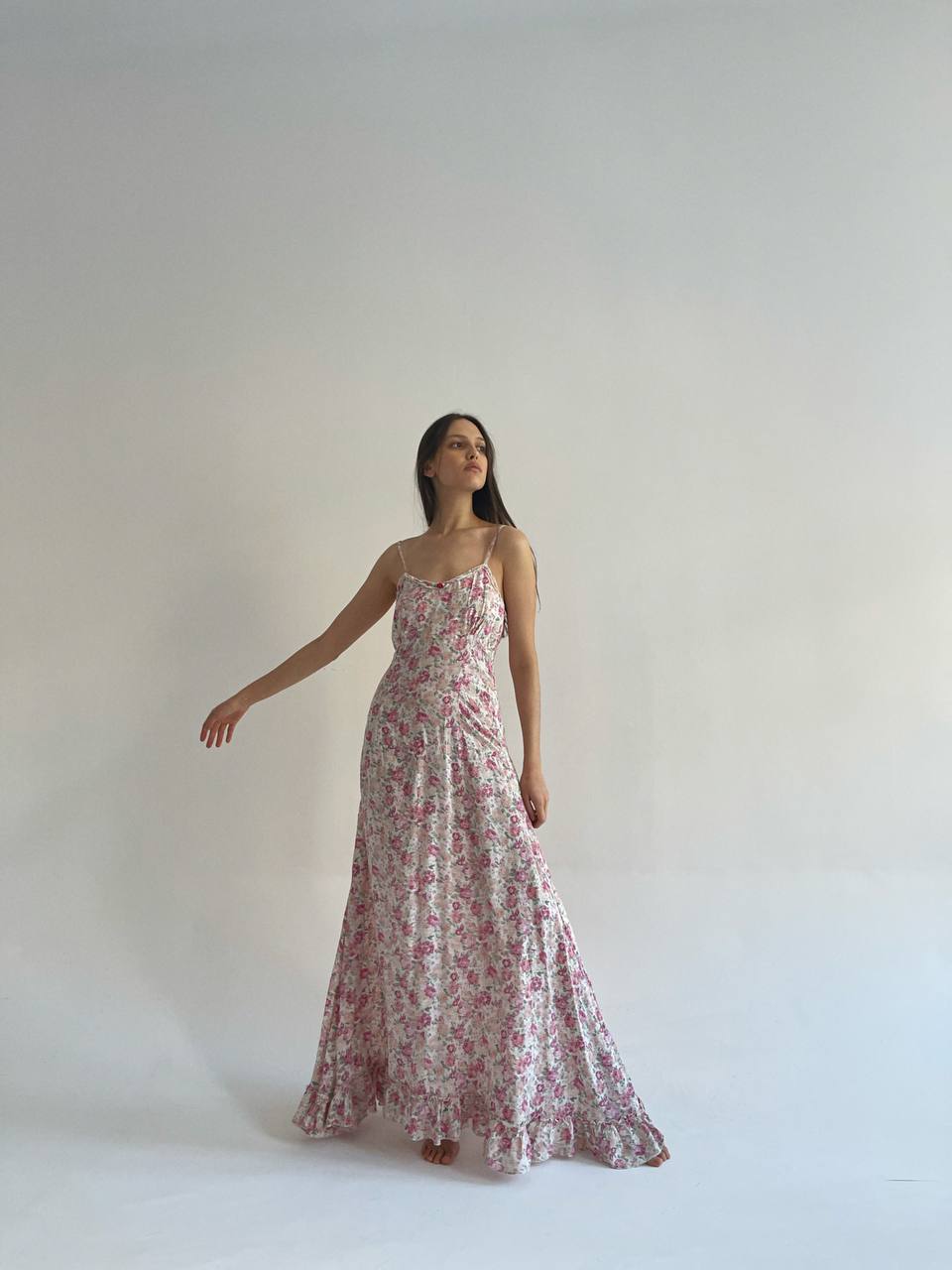 Long maxi dress with pink flower pattern and ruched bottom