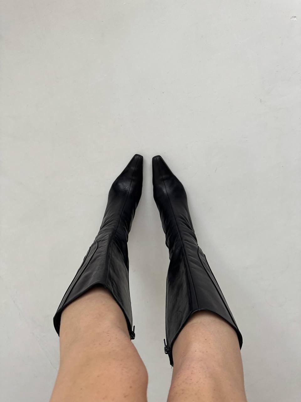 Vintage black faux leather knee high pointy boots