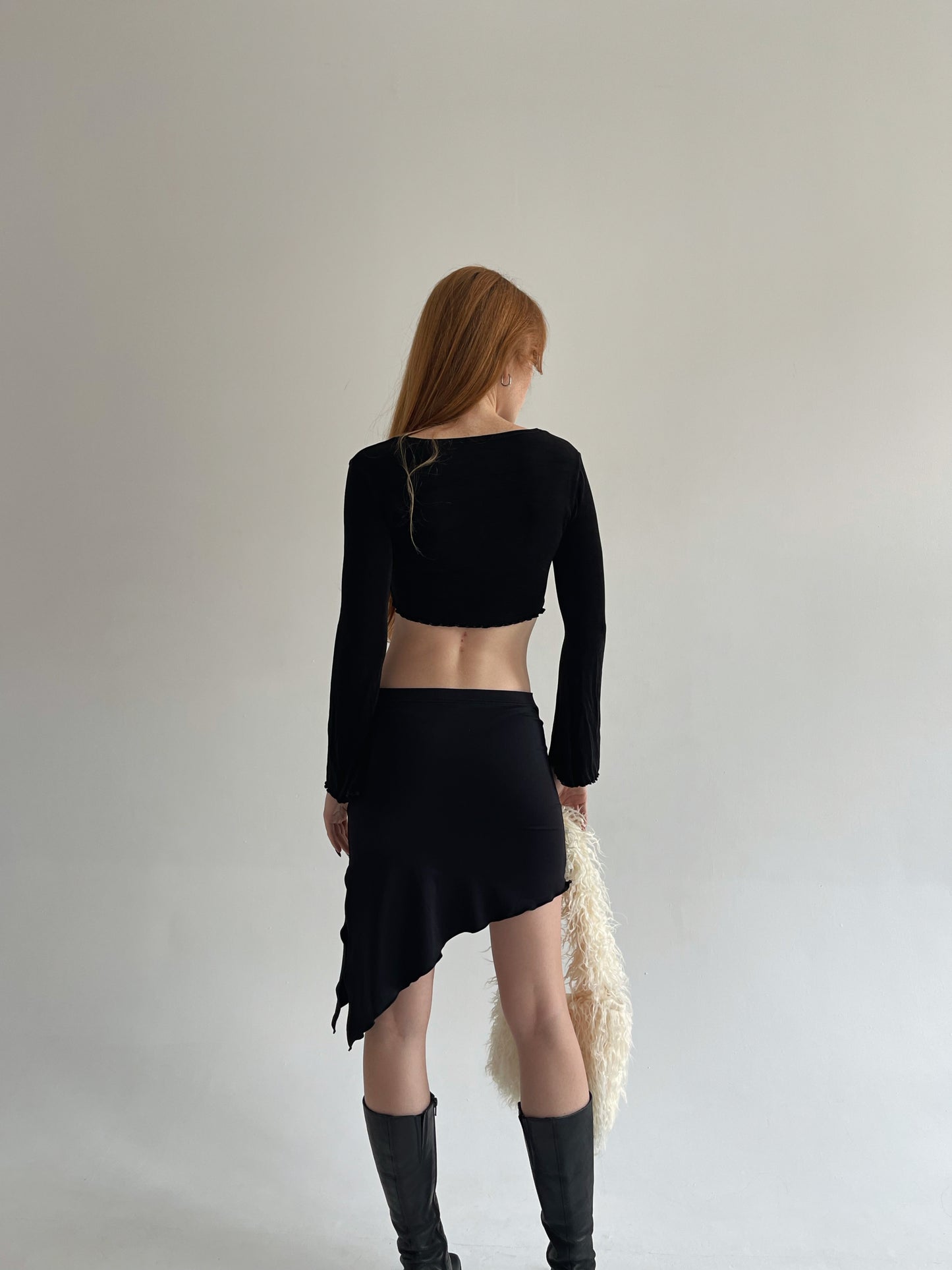 Vintage stretchy asymmetrical black skirt