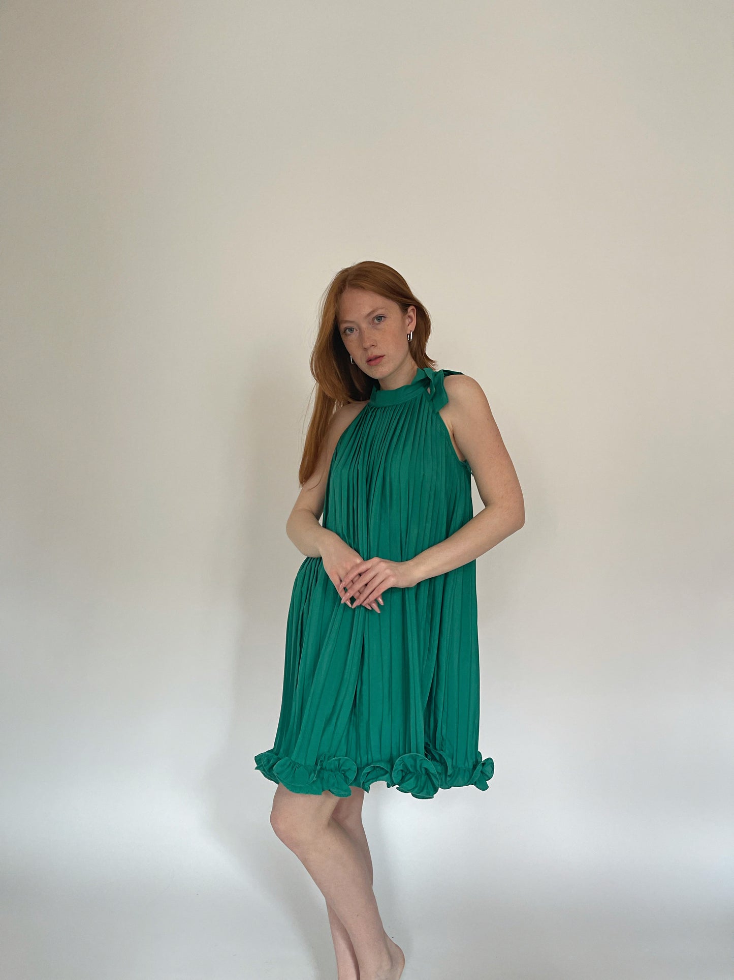 Vintage pleated mini dress with ruched ruffled hem