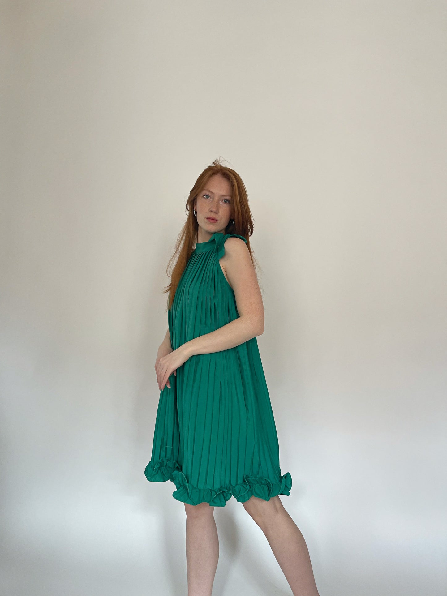 Vintage pleated mini dress with ruched ruffled hem