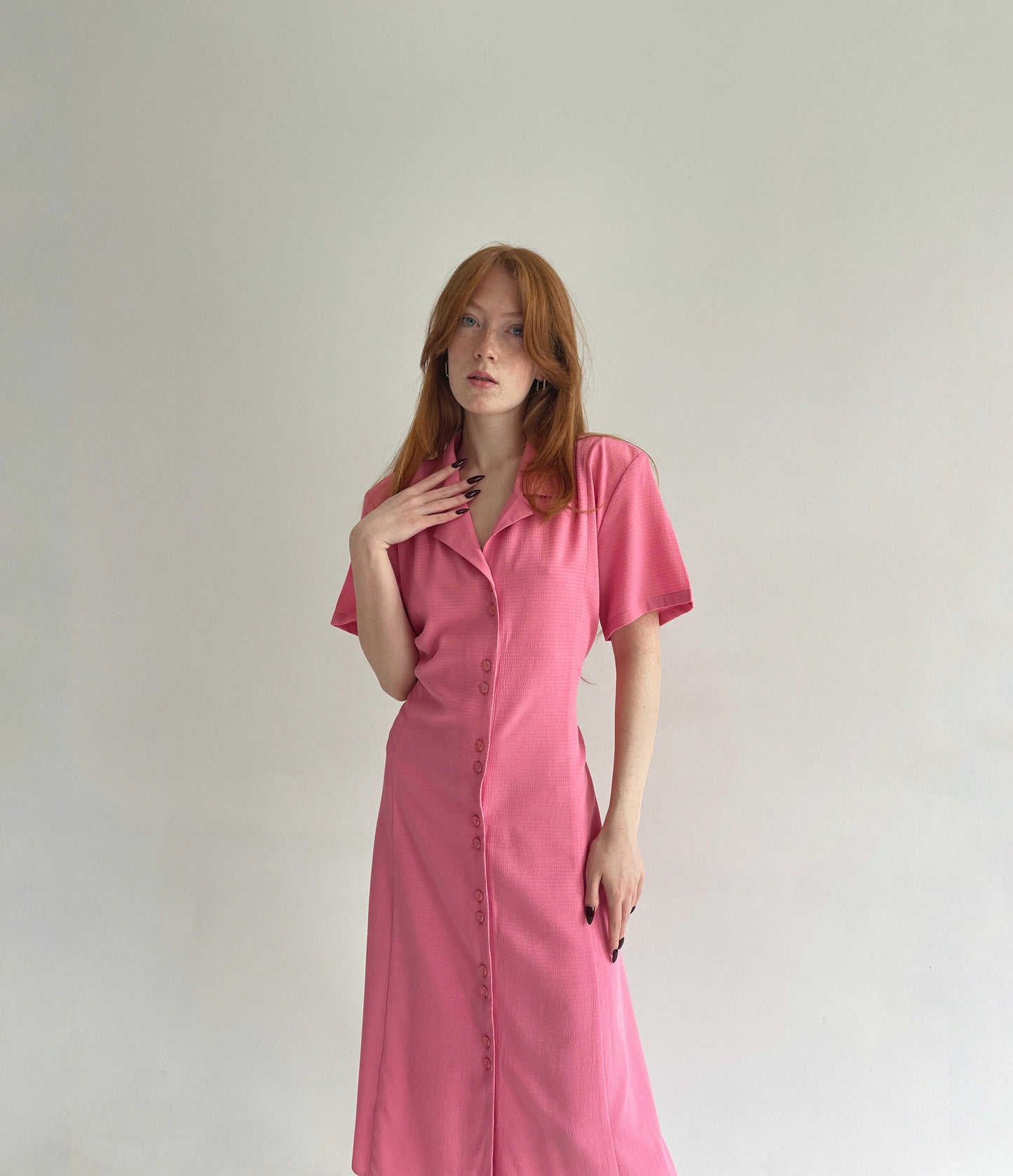 Vintage button up dress made of 67% viscose