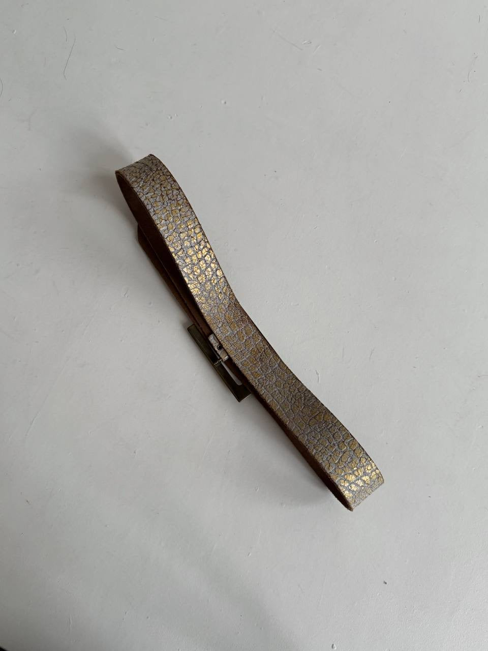 Vintage leather belt with gold cracking