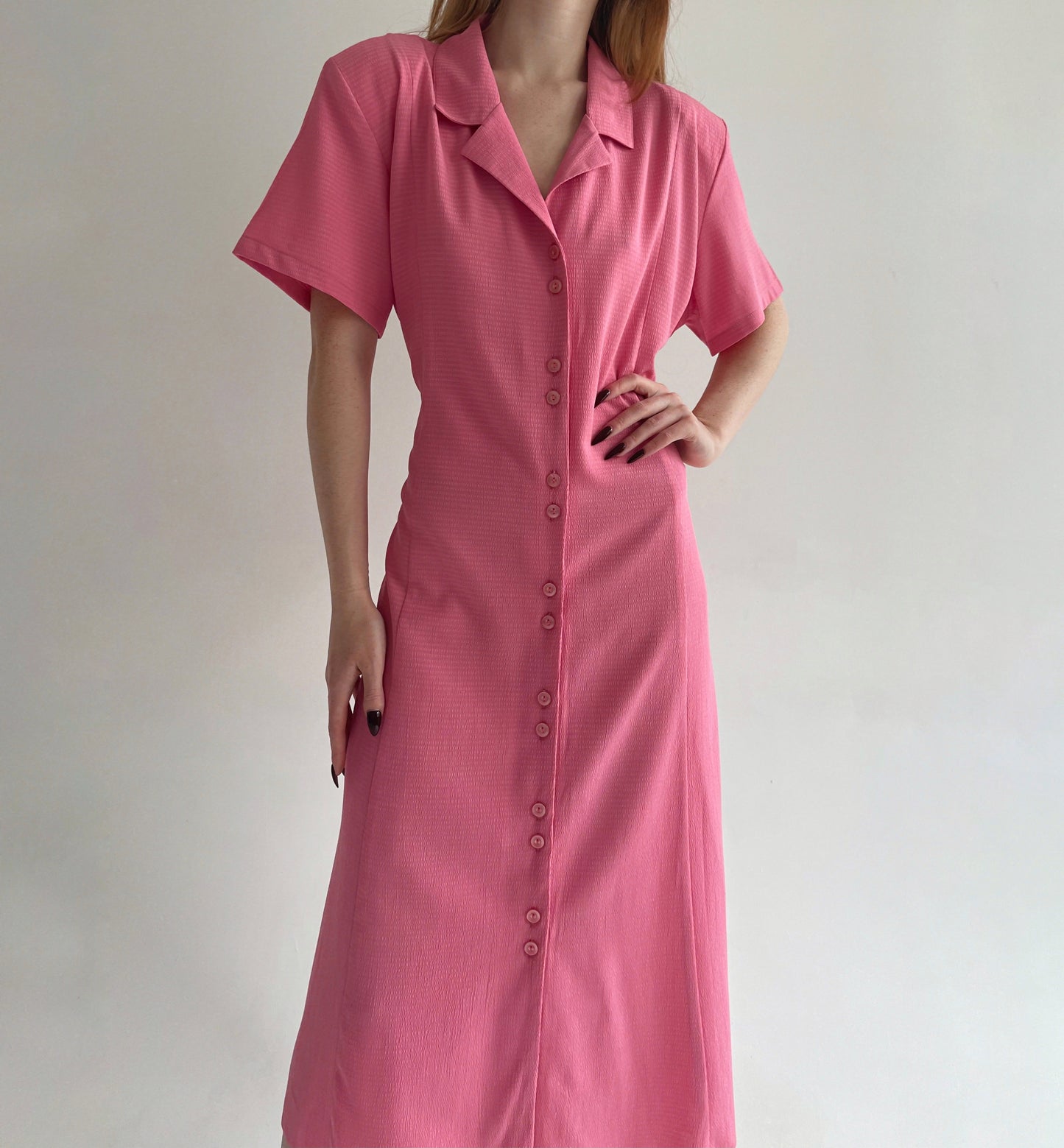 Vintage button up dress made of 67% viscose