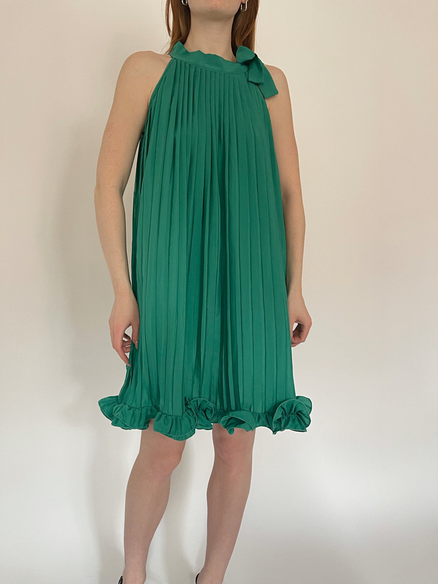 Vintage pleated mini dress with ruched ruffled hem