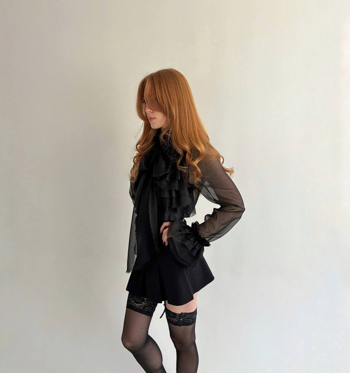 Y2K sheer black blouse with raw trim