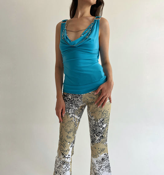 Vintage turquoise top with a necklace