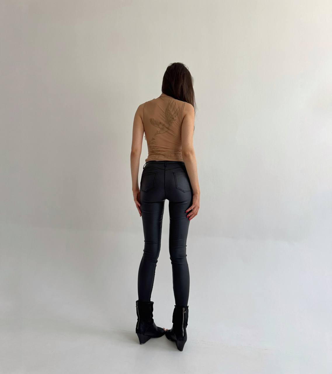 Black wax skinny jeans