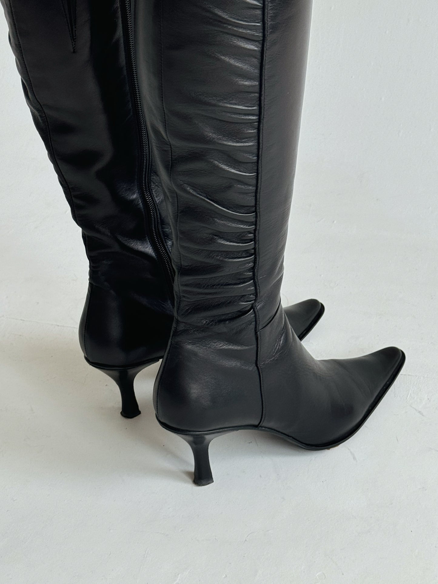 Vintage made in Italy leather knee high pointy boots