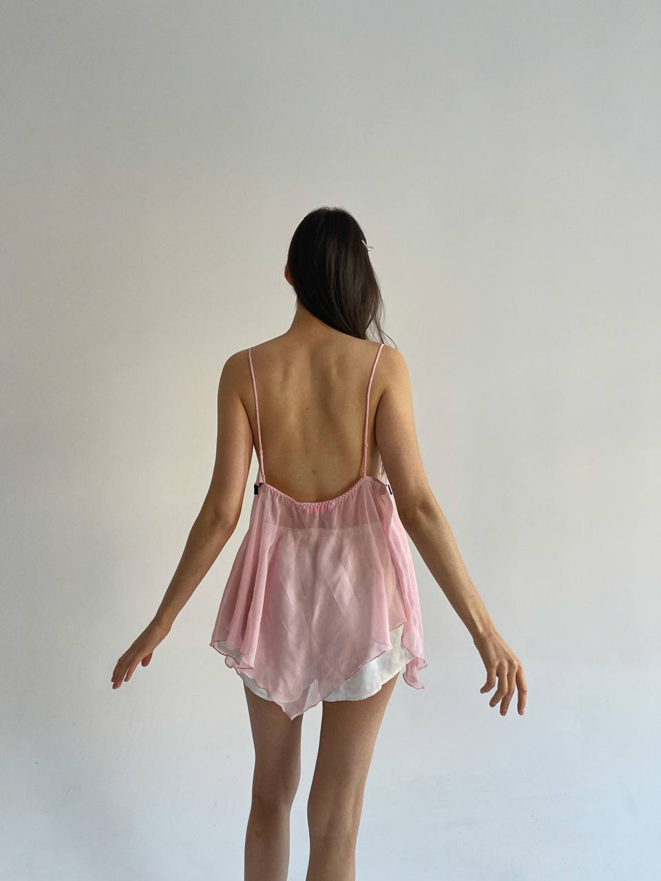 Baby pink sheer cami top with black bow