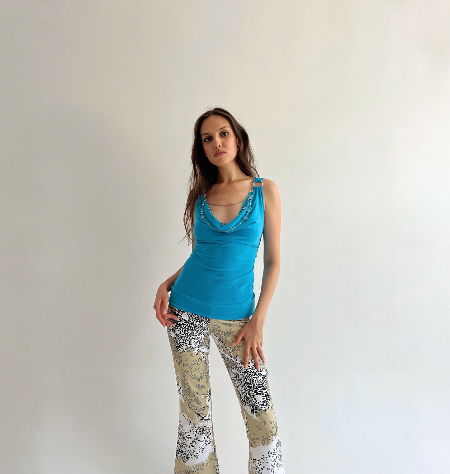 Vintage turquoise top with a necklace