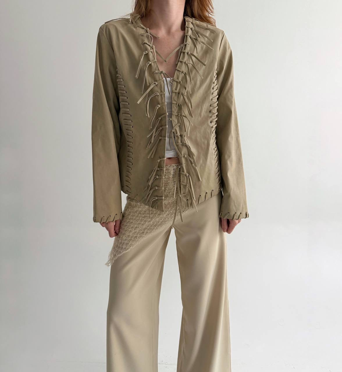 Vintage beige faux leather jacket with fringe detailing