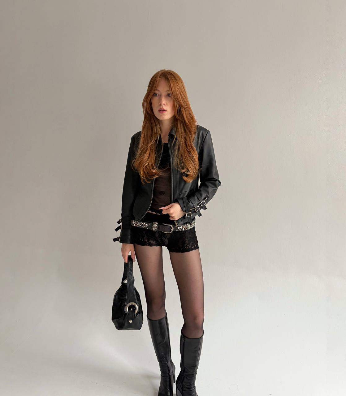 Vintage black faux leather jacket with belts