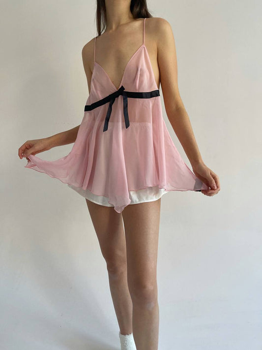 Baby pink sheer cami top with black bow