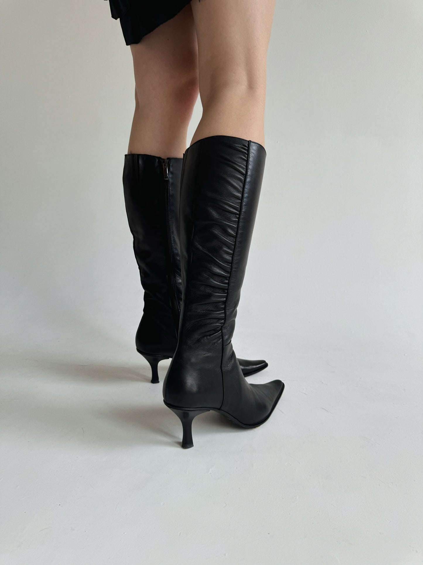 Vintage made in Italy leather knee high pointy boots