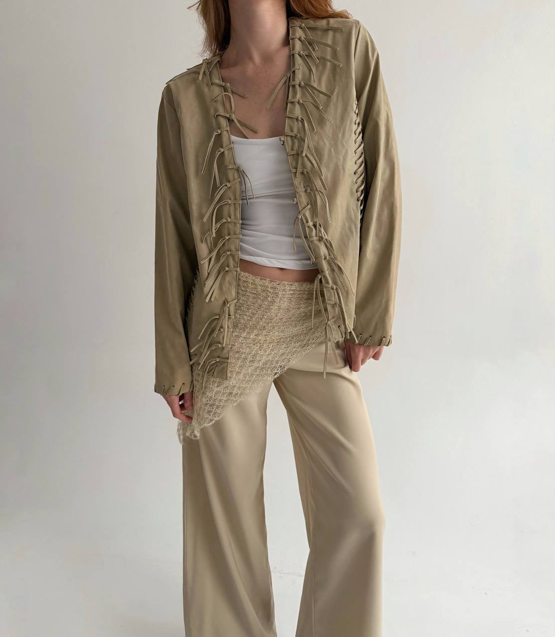 Vintage beige faux leather jacket with fringe detailing