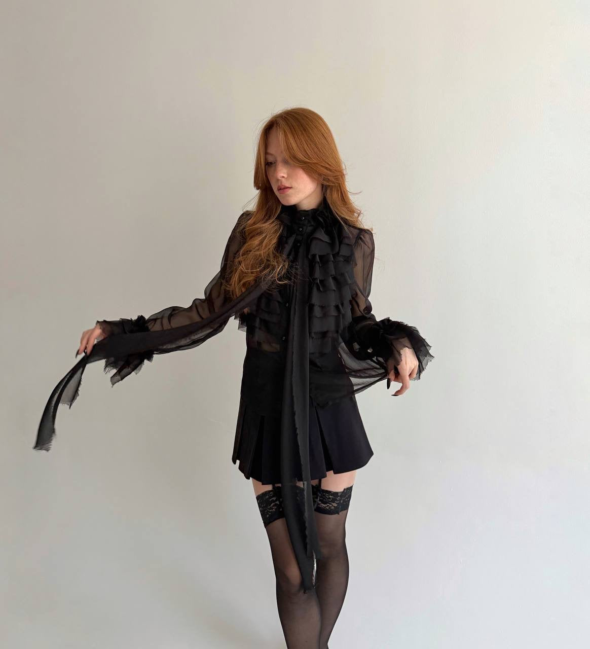 Y2K sheer black blouse with raw trim