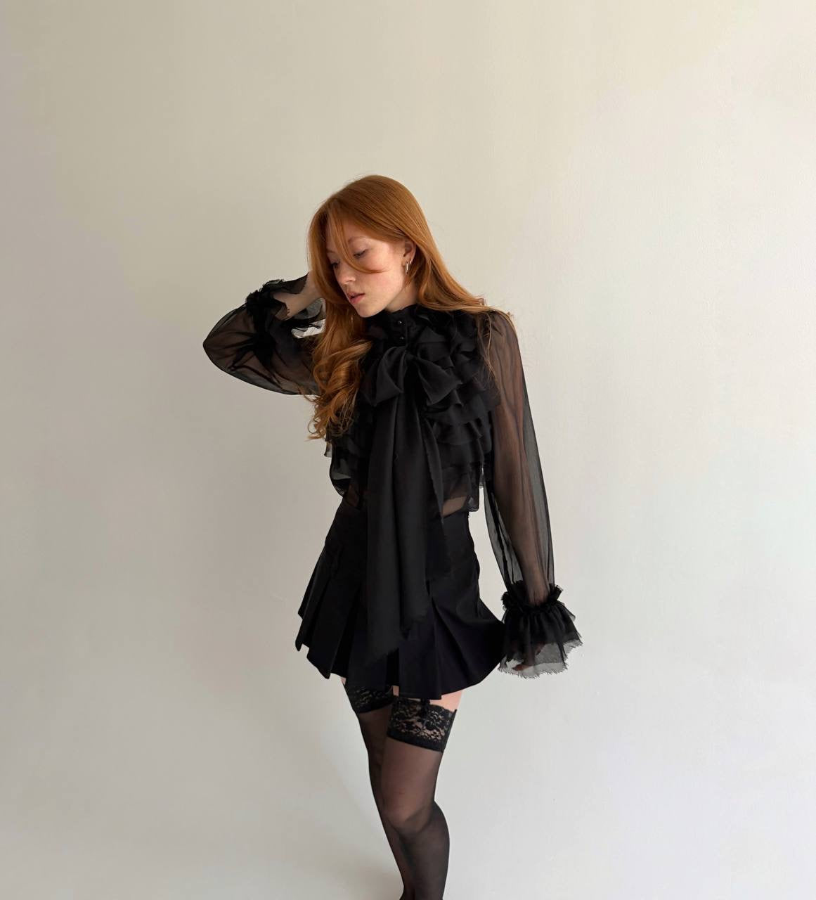 Y2K sheer black blouse with raw trim