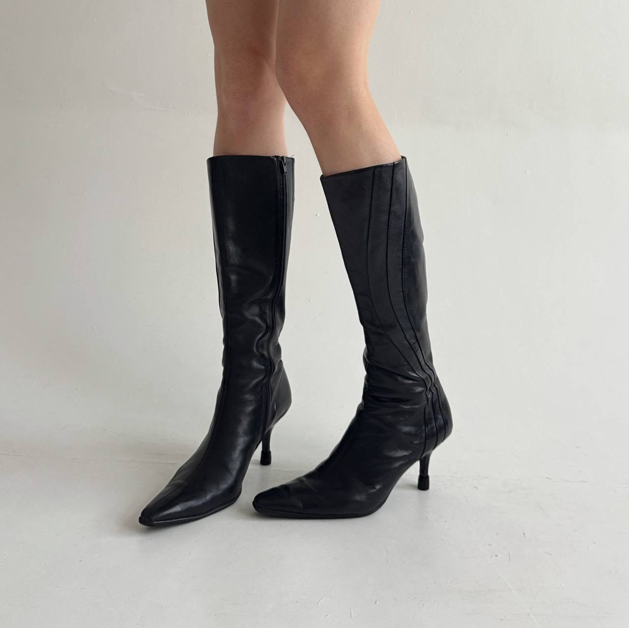 Vintage black faux leather knee high pointy boots