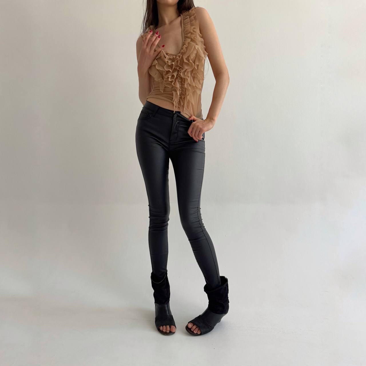 Black wax skinny jeans